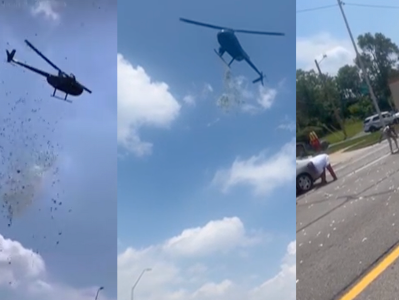 Minlərlə dolları helikoptertdən səpdilər