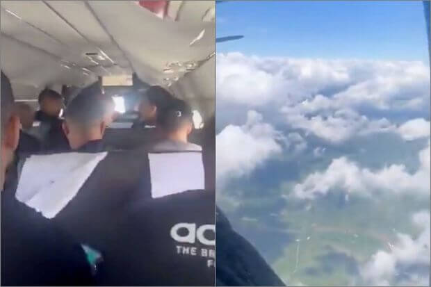 Sərnişinlərlə dolu təyyarənin uçuş zamanı qapısı açıldı - VİDEO